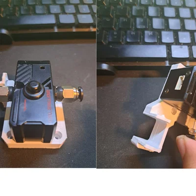 Giá đỡ BTT SFS v2.0 trên khung động cơ Stepper Axis với phần đính kèm chuỗi kéo