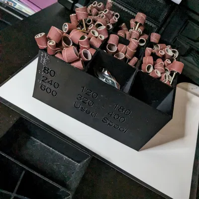 Người tổ chức giấy nhám Dremel