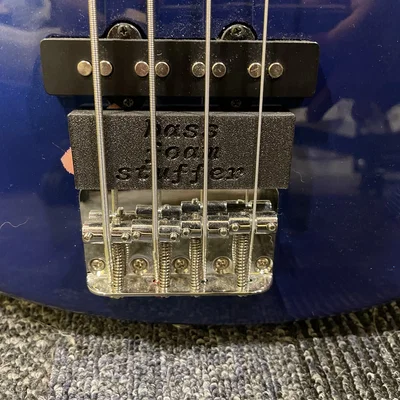 Người trợ giúp bass cầu guitar boam