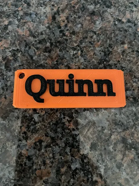 Chuỗi khóa có tên Quinn trên đó - Image 1