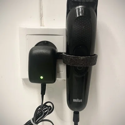 Người giữ máy cạo râu Braun