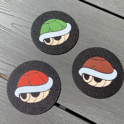 Giá đỡ cốc Mario Kart với vỏ đỏ/xanh