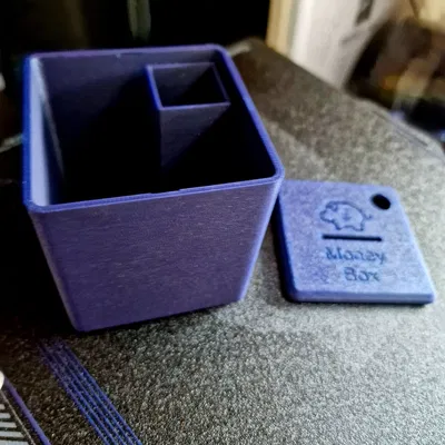 Hộp tiền tiết kiệm cho xu và tiền giấy