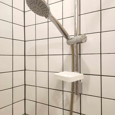 Giá đỡ đồ dùng tắm gắn trên bếp tắm GROHE