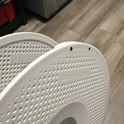 Kẹp cuộn filament Bambu Forever V2 với thiết kế cải tiến