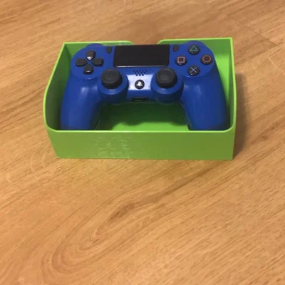 Giá đỡ tay cầm PS4 với chức năng sạc