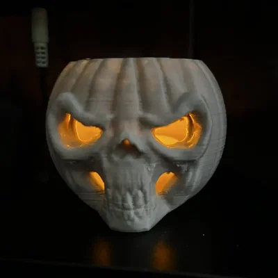 Đèn tealight bí ngô hình sọ người trang trí Halloween