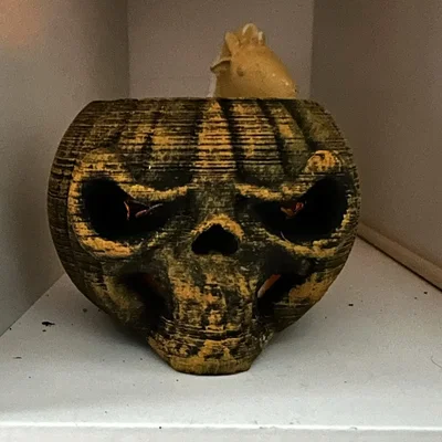 Đèn tealight bí ngô hình sọ người trang trí Halloween