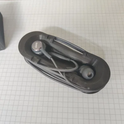 Bộ tổ chức cáp tai nghe in-ear nhỏ gọn