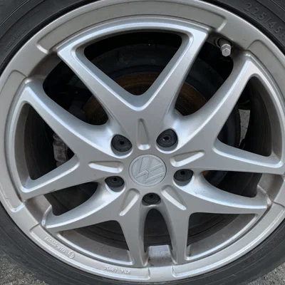 Nắp mâm xe VW 52 mm với logo mới nhất