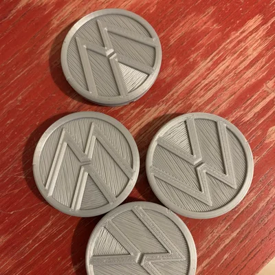 Nắp mâm xe VW 52 mm với logo mới nhất