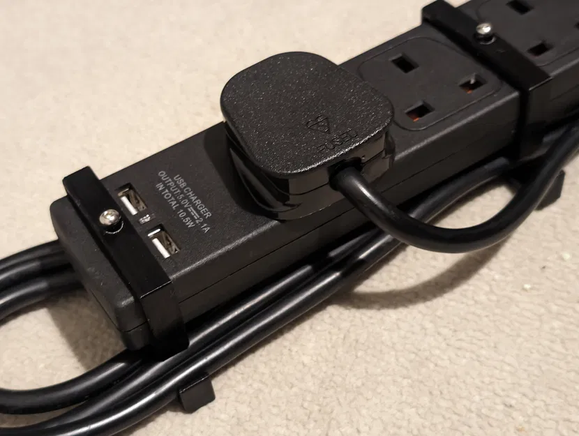 Kẹp quấn dây cáp cho ổ cắm đa năng - Image 1