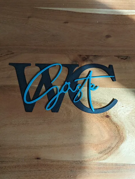 Biểu trưng nhà vệ sinh Gäste/Guests bằng chữ viết nghệ thuật - Image 1