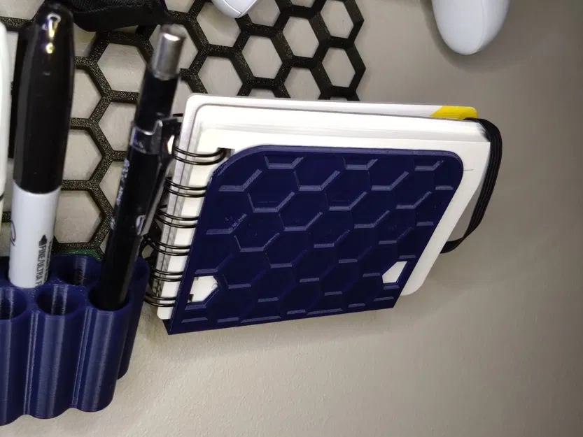 Giá đỡ sổ tay cho tường lưu trữ Honeycomb - Image 1