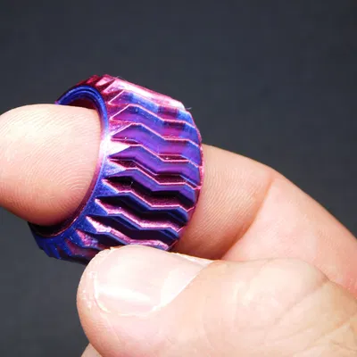 Nhẫn thư giãn bánh răng với thiết kế xoắn bốn lớp