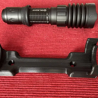 Giá đỡ đèn pin Olight Warrior 4X gắn tường hoặc tủ