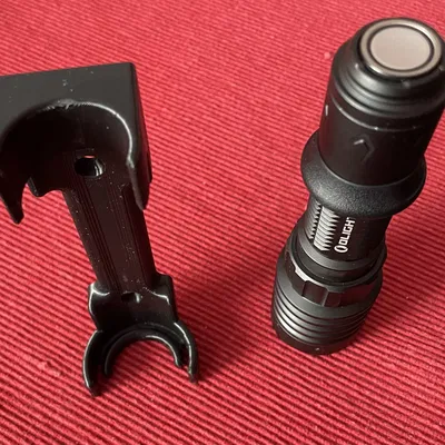 Giá đỡ đèn pin Olight Warrior 4X gắn tường hoặc tủ