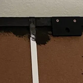 Giá đỡ treo tranh ghép hình trên tường