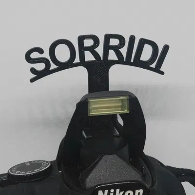 Thiết bị tạo nụ cười phản xạ cho ảnh chụp