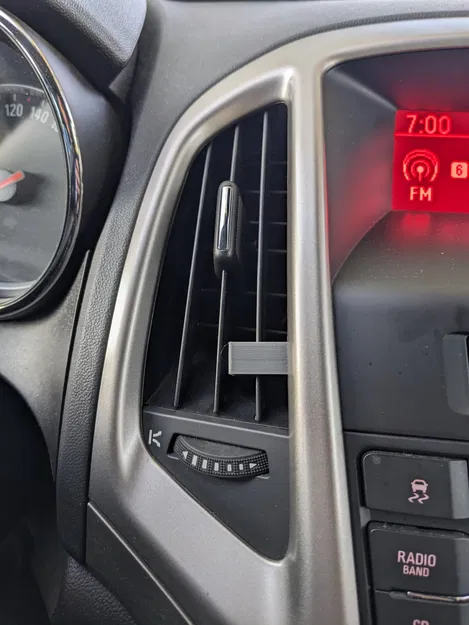 Bộ chặn lưới gió Opel Astra J 2011 cho giá đỡ smartphone - Image 1