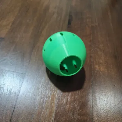 Máy phát đồ ăn cho mèo hình hành tây lắc lư