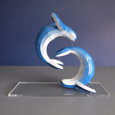 Cá voi sơn tay phong cách low poly trong trạng thái vui chơi