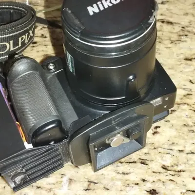 Bộ thích ứng pin cho máy ảnh Nikon CoolPix P500