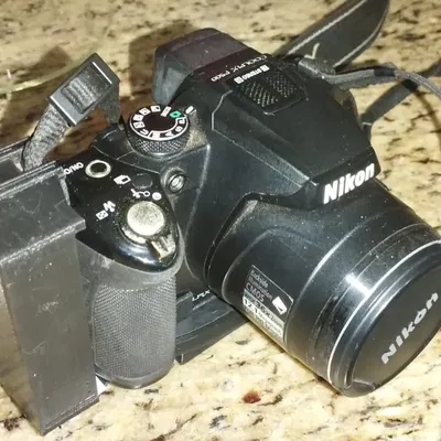 Bộ thích ứng pin cho máy ảnh Nikon CoolPix P500