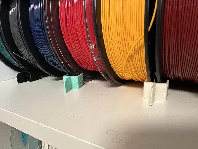 Giá đỡ cuộn filament ngăn chặn cuộn lăn - Image 1