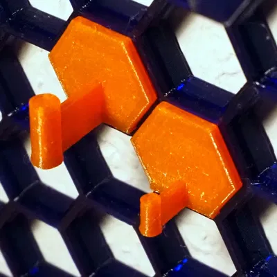 Móc treo tham số cho tường lưu trữ tổ ong