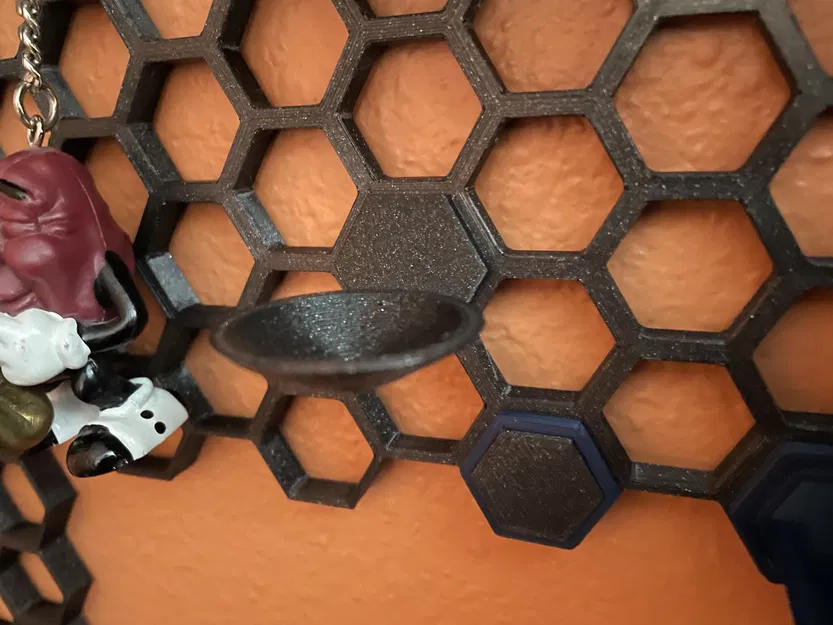 Giá đỡ bóng golf cho tường tổ ong HSW - Image 1