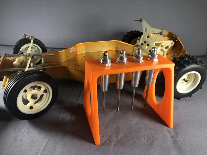 Giá đỡ và kệ cho bộ giảm chấn RC10 - Image 1