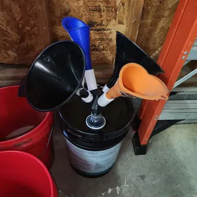 Giá đỡ nhiều phễu - Bộ thu dầu nhỏ giọt