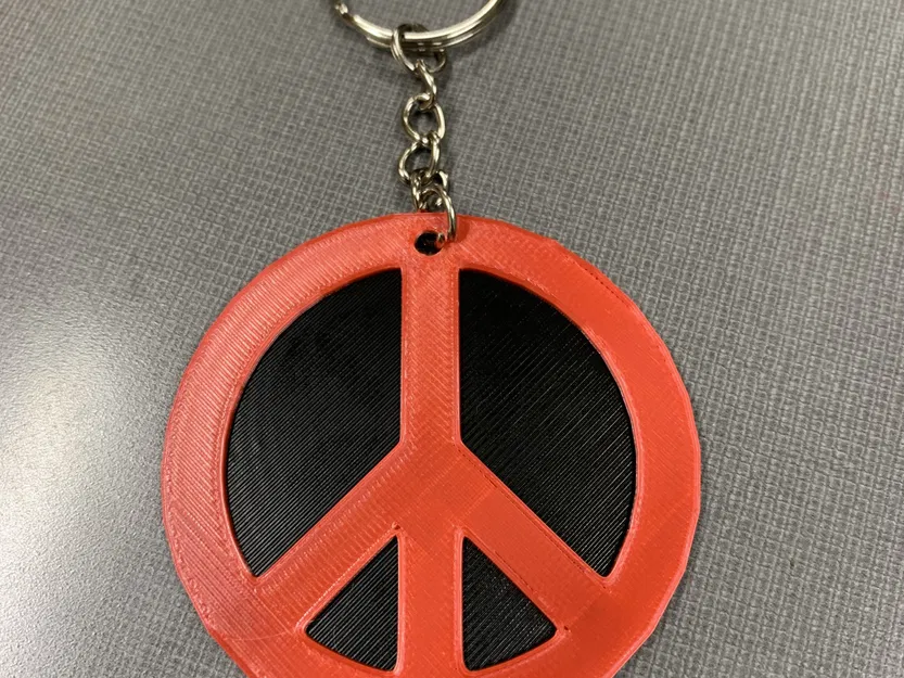 Móc khóa biểu tượng hòa bình 3D với thiết kế độc đáo - Image 1