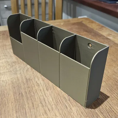 Giá đỡ điều khiển từ xa treo tường 4 ngăn