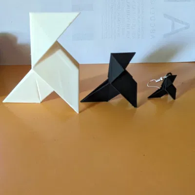 Pajarita: Tượng điêu khắc và Bông tai