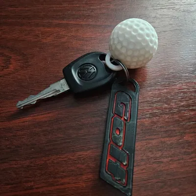 Móc khóa hình bóng golf để giữ chìa khóa an toàn