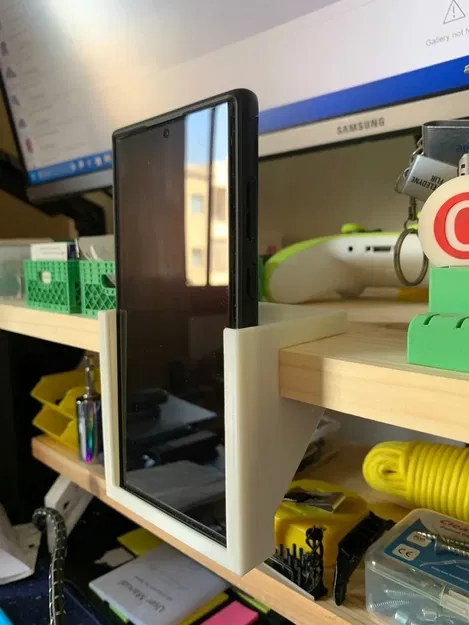 Giá đỡ điện thoại Samsung Galaxy S22 Ultra trượt trên kệ - Image 1