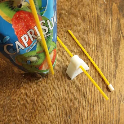 Ống hút cam đi kèm túi đơn CapriSun