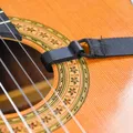 Giá đỡ dây đeo guitar gắn từ lỗ âm thanh - Thumbnail 1