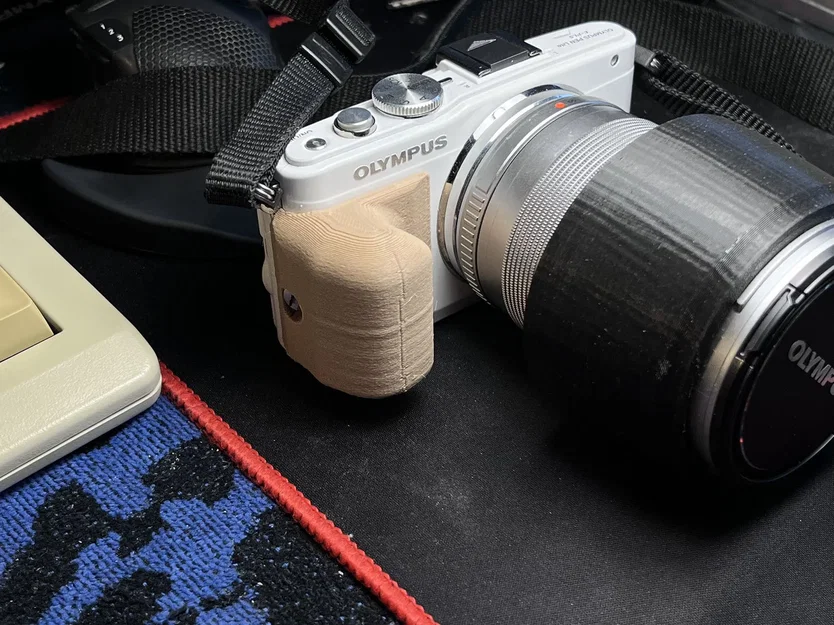 Giá đỡ camera Olympus E-PL5 cho phép chụp ổn định - Image 1