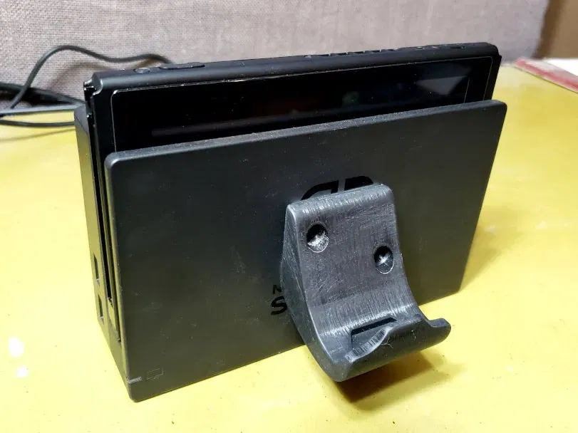 Giá đỡ tay cầm Nintendo Switch Pro gắn tường hoặc trên Switch - Image 3