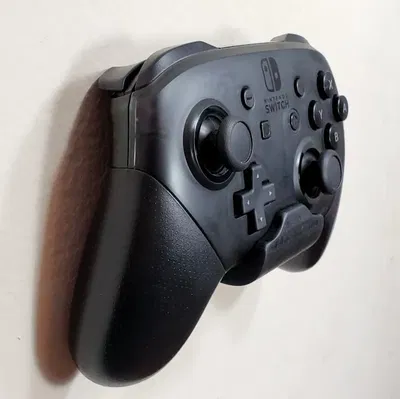 Giá đỡ tay cầm Nintendo Switch Pro gắn tường hoặc trên Switch