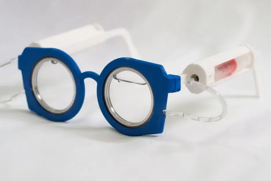 Kính tự điều chỉnh có ống tiêm điều chỉnh độ cận - Image 1