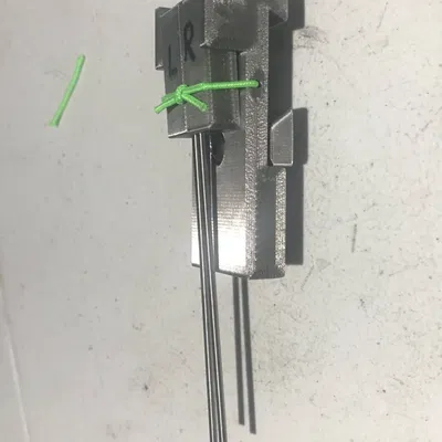 Thiết bị hỗ trợ tập luyện bắn cung với clicker đôi