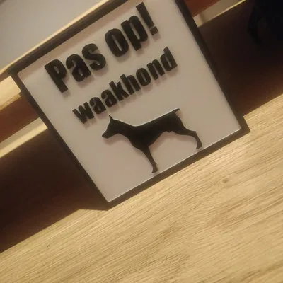 Biển cảnh báo cho chó giữ nhà bằng tiếng Hà Lan