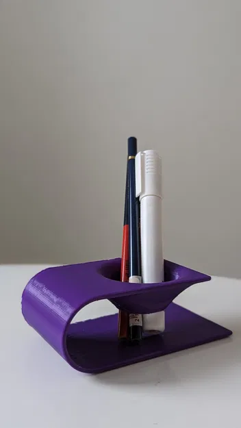 Giá đỡ bàn làm việc hình lỗ đen độc đáo - Image 1