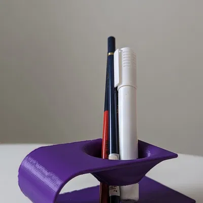 Giá đỡ bàn làm việc hình lỗ đen độc đáo