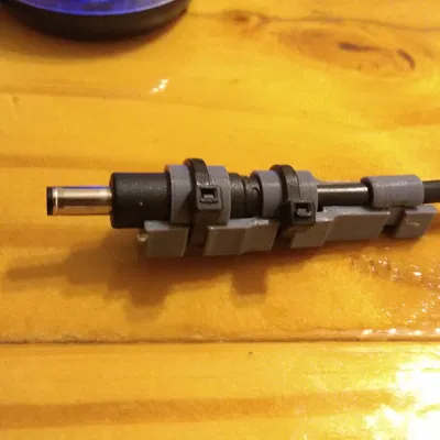 Giá đỡ cáp nguồn Dell chống gãy cho laptop