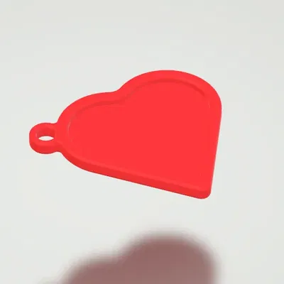 Móc khóa hình trái tim để đặt ảnh vào